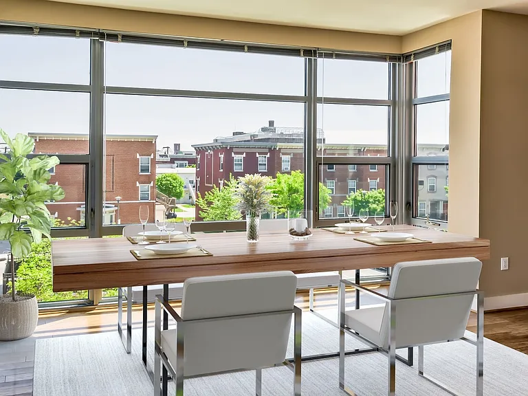 Floor to ceiling windows in each home and wood flooring throughout