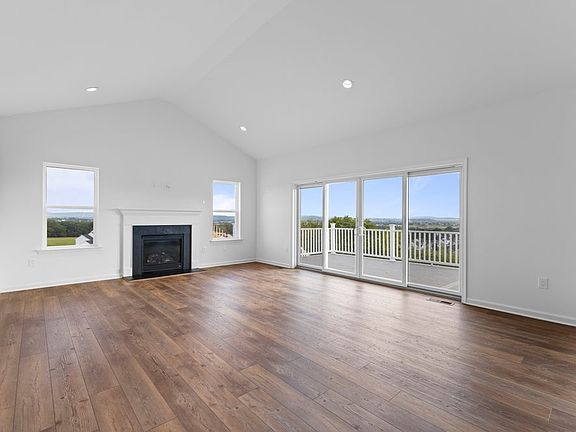Great Room with Optional Fireplace Window Package and Added Sliding Glass Doors