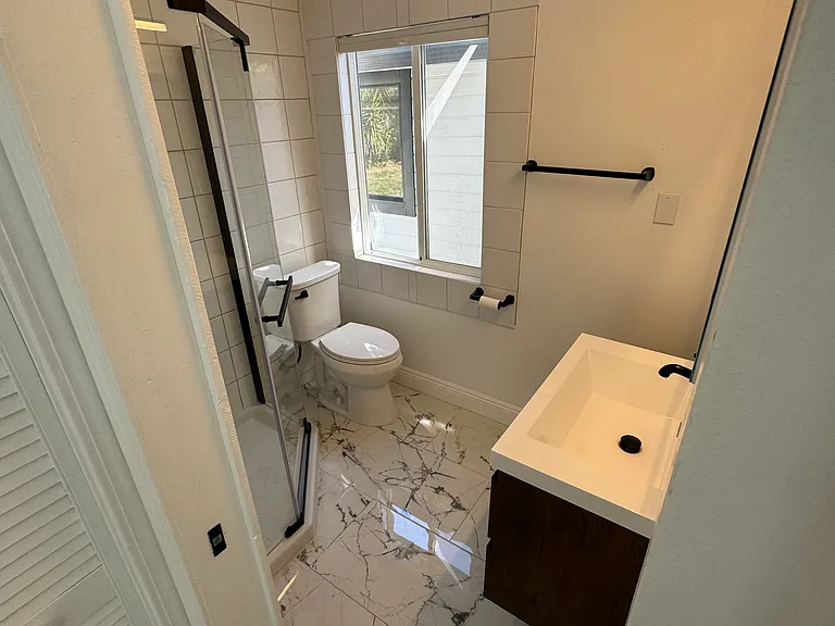Newly renovated bathroom with all high end Delta fixtures.