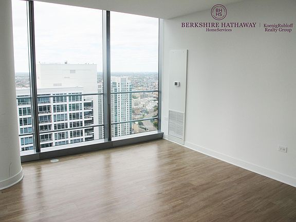 2nd image of 348 W Wolf Point Plz #405
