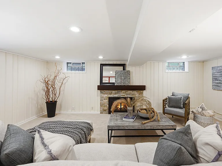 Downstairs living area with gas fireplace. Carpet freshly cleaned.