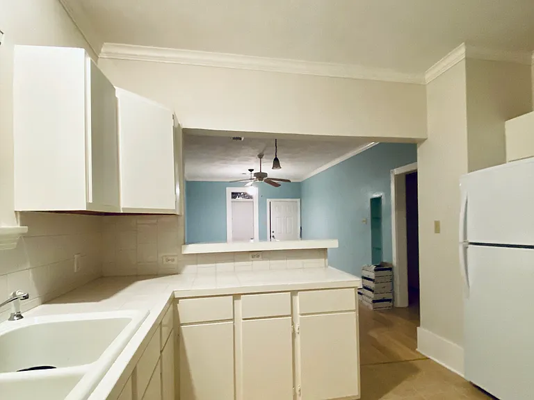 Kitchen has plenty of space.
Lots of cabinets plus a pantry