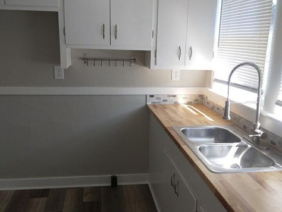 Kitchen with new countertops and flooring