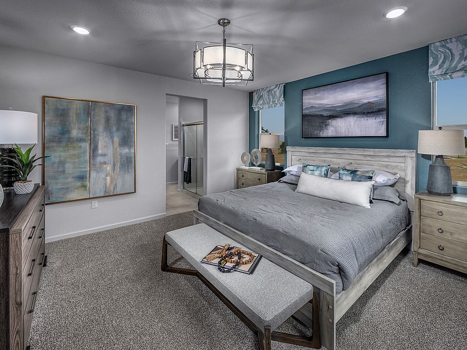 Spacious primary bedroom of a Residence 1.