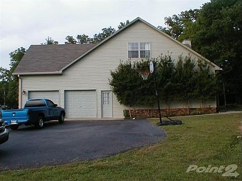 Home has oversized to car garage with ex-large bonus room above it.