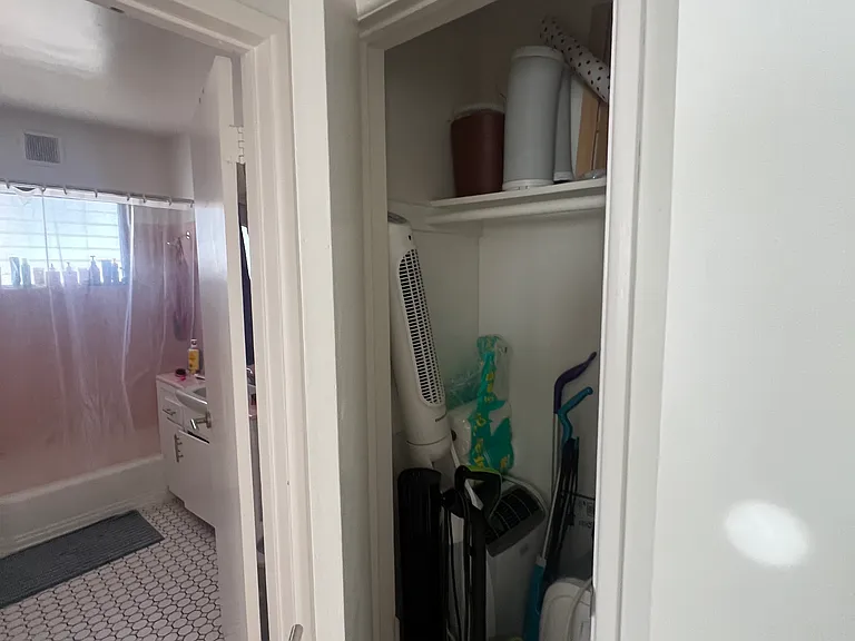 Hall Closet by Bedroom/Bathroom 1