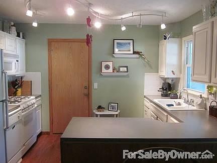 Dining Room
						:
						Easily fits a large dining room table.