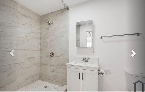 5th image of 1033 W 57th St #1-4
