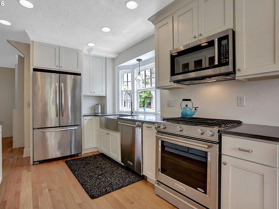 updated kitchen with all stainless steel appliances.