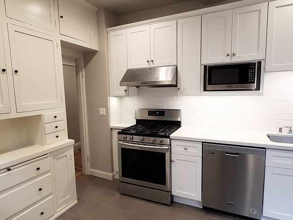 Renovated kitchen w/ under-cabinet lighting