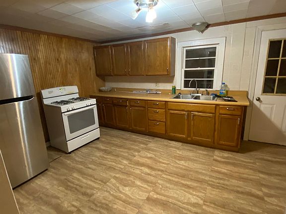Kitchen with modern appliances and cabinets