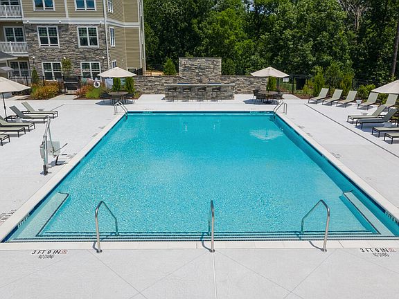 Experience ultimate relaxation at our stunning poolside oasis.