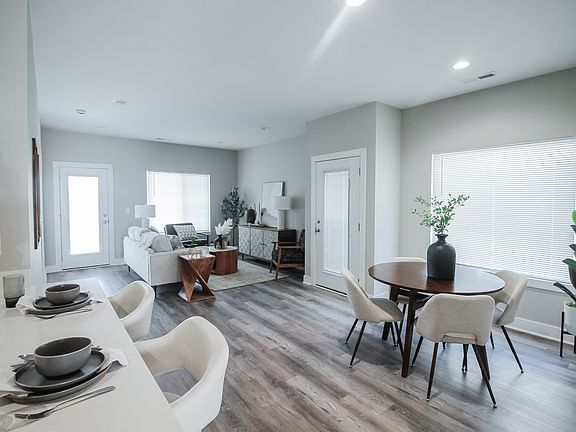 Living Room & Dining Room with Vaulted Ceilings (not shown in model)