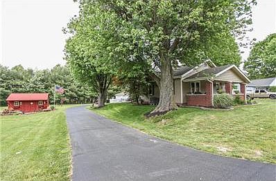 This is the drive back to the 36x24 garage. New sealcoat on both drives in 2015.