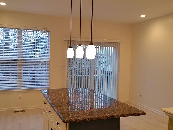 New recessed lighting & pendents over island