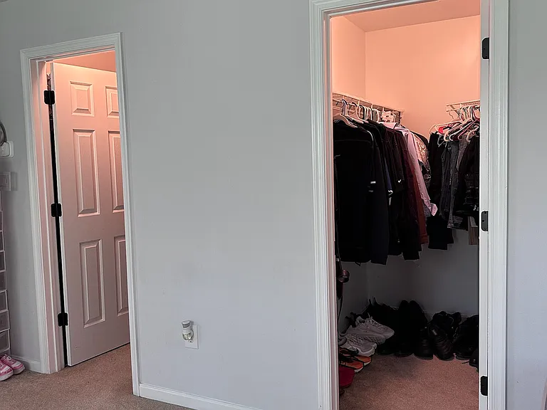 Master bedroom walk-in closets (2)
