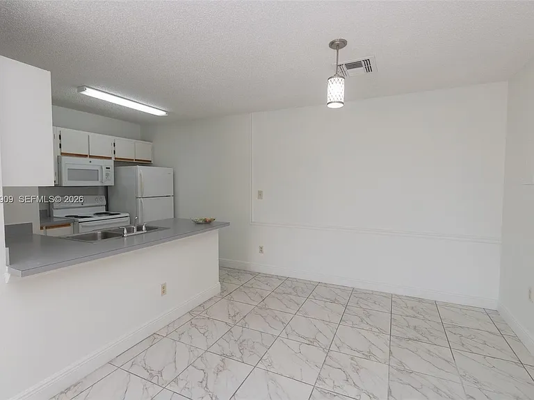 18304 NW 68th Ave #L — Photo 9