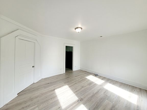 Living room with bedroom and kitchen access