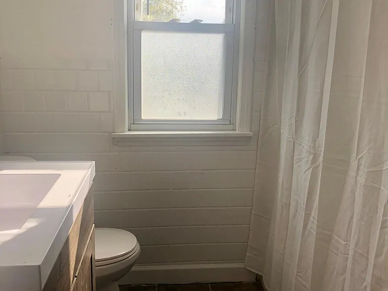 Upstairs bath with new vanity.