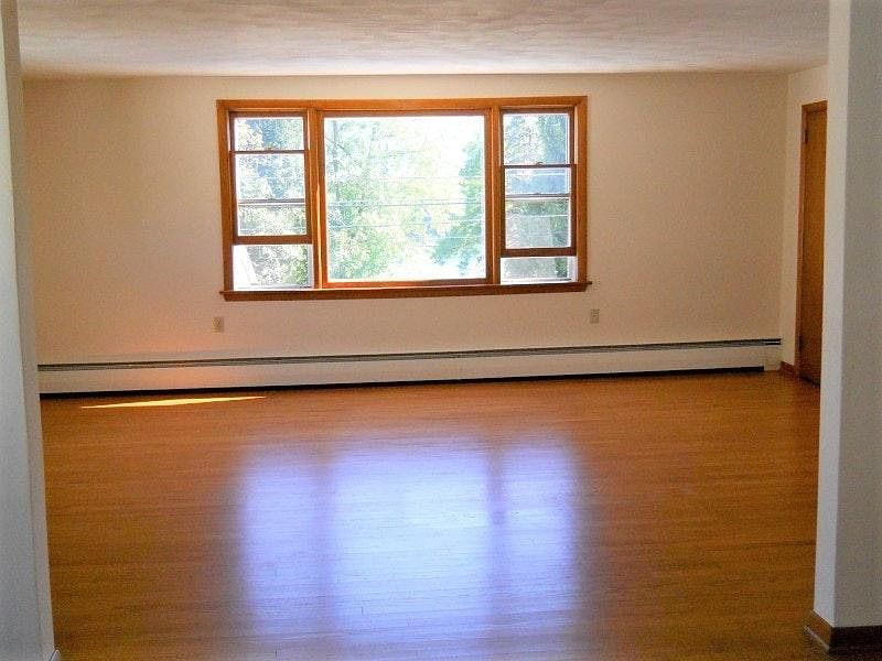large living room with view of the river