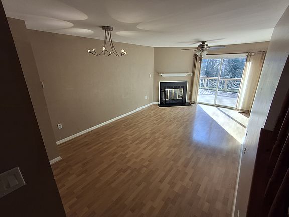 Big living room with wood flooring