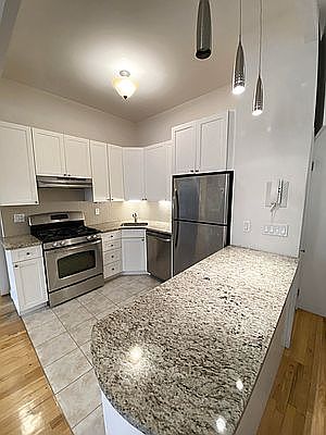 3rd image of 219 E 2nd St APT 1B