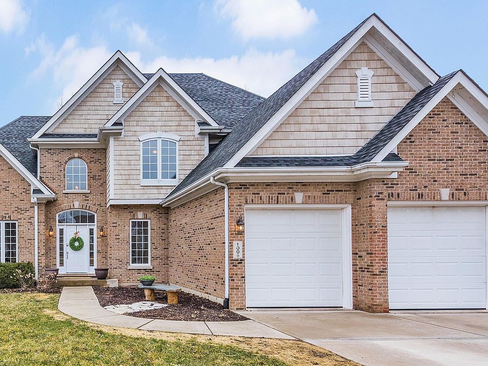 Lovely Brick & Cedar Home with 3 Car Tandem Garage On Cul-de-sac.  Close to Downtown, Schools, Parks