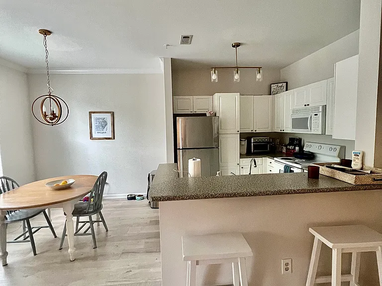 Kitchen, to show full layout, which has been updated per the most recent photo with all stainless steel appliances
