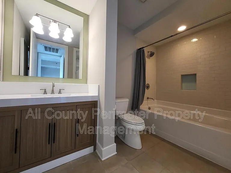 4561 Olde Perimeter Way #406 — Photo 2