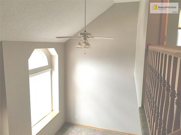Living room has vaulted ceiling.  New paint