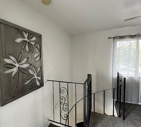 Spiral staircase to downstairs studio