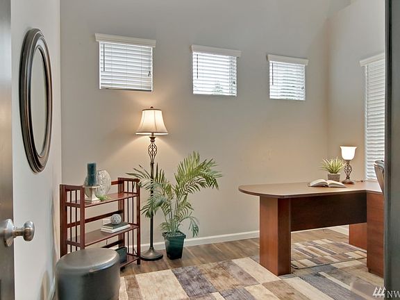 Main floor den office with double doors