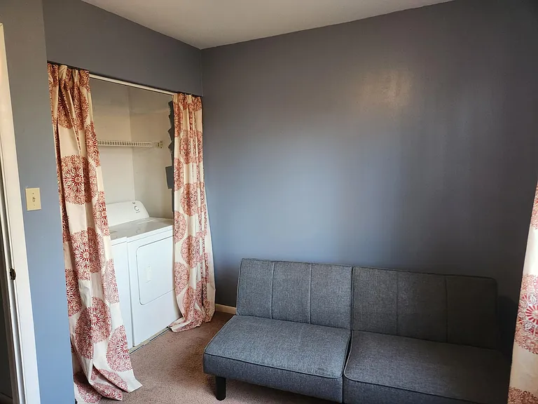 Spare room with washer and dryer