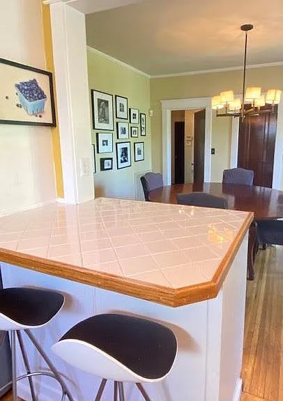 Kitchen view towards round table dining