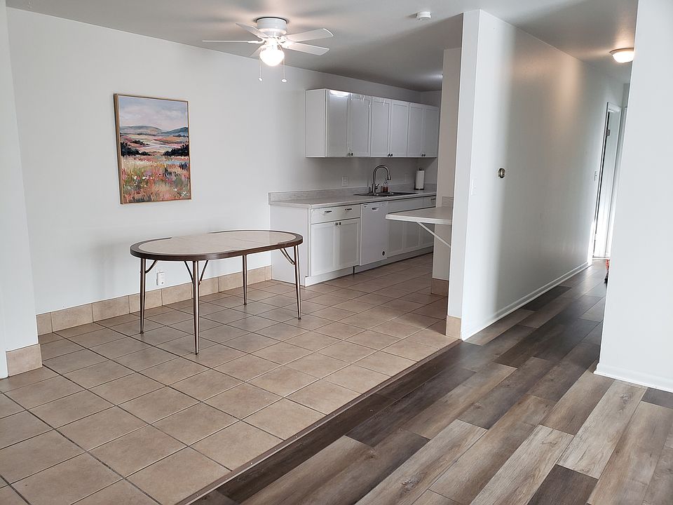 Kitchen with dining area. New cabinets. New dishwasher. Fresh paint.
