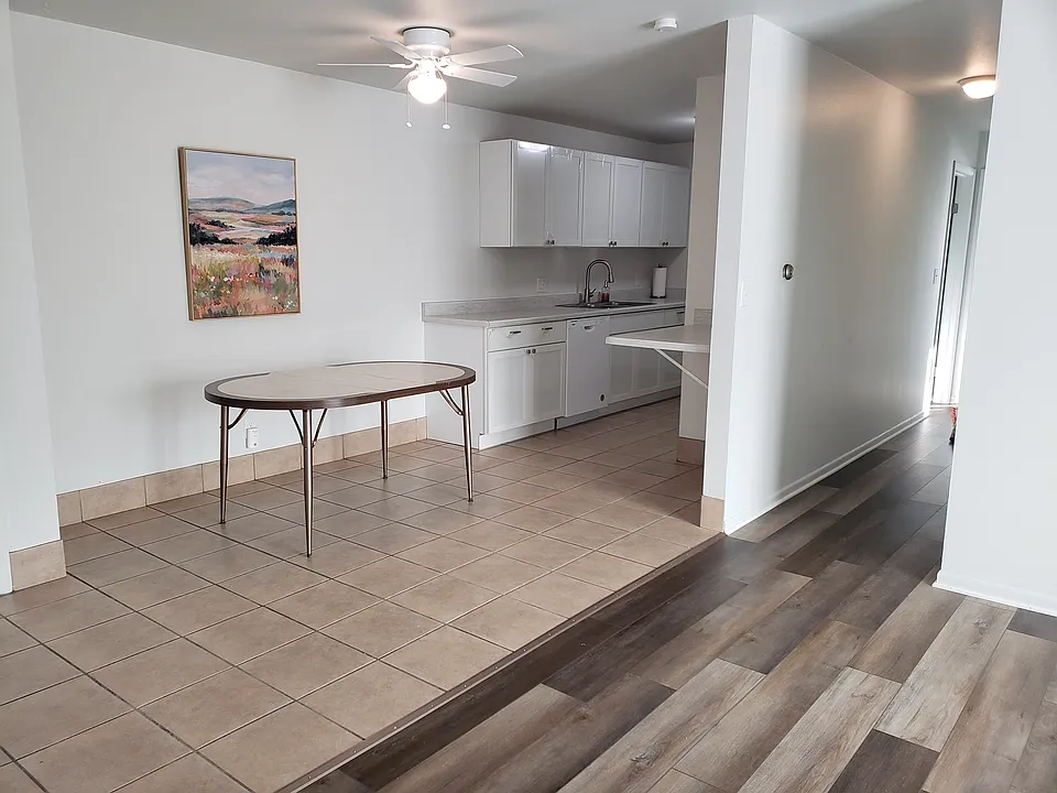 Kitchen with dining area. New cabinets. New dishwasher. Fresh paint.