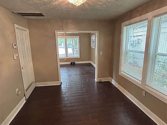 Dining Room with Partial Picture of Living Room.
