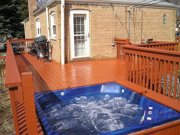 deck with hot tub
