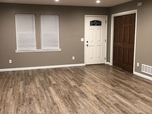 Living room, front door, entry closet.