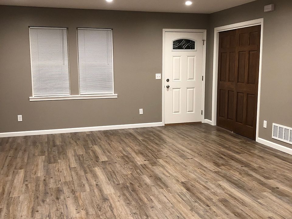 Living room, front door, entry closet.