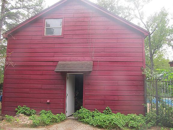 3 Car garage has storage with above.  Could be converted to apartment.