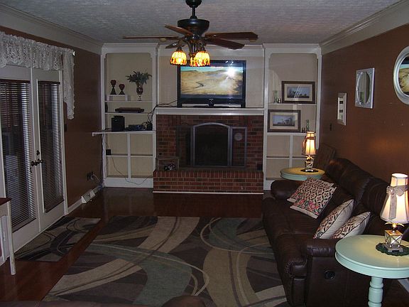 sunken den with fireplace