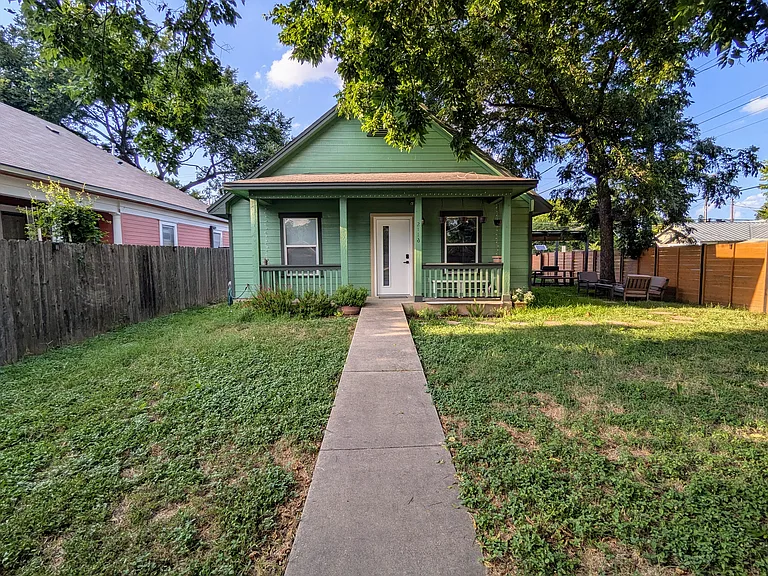 Front yard with view of the cute front porch