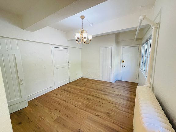 Large bright main living space with high ceilings