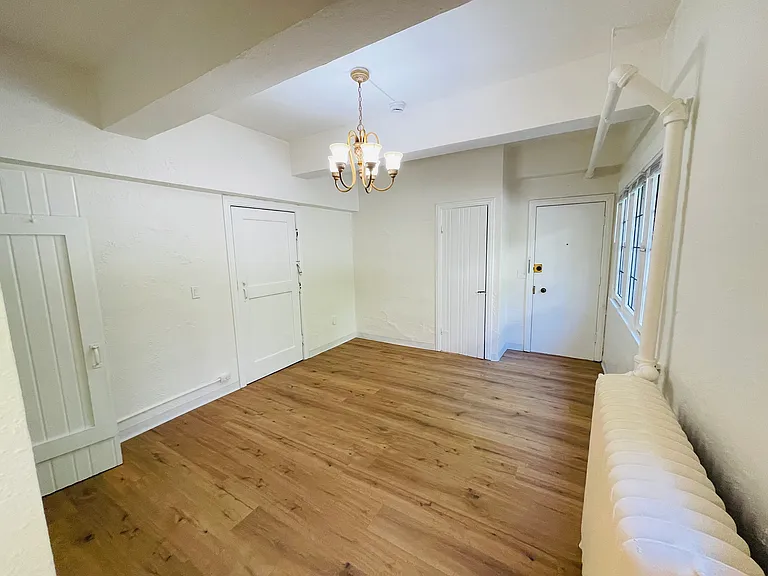Large bright main living space with high ceilings
