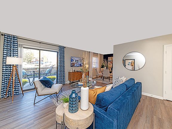 Spacious living room with hardwood-style flooring