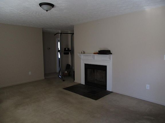 Living room with wood fireplace