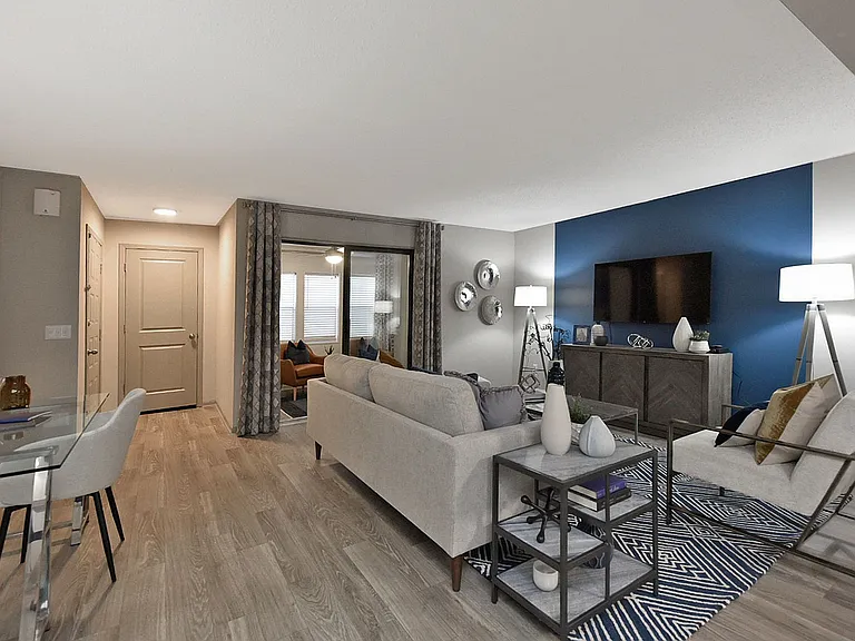 Spacious living room with hardwood-style flooring
