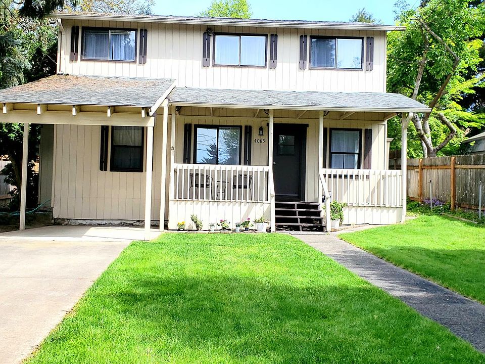 Front yard, covered porch, carport