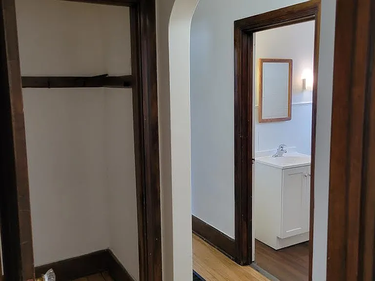 Hallway to closet, bathroom and bedrooms.